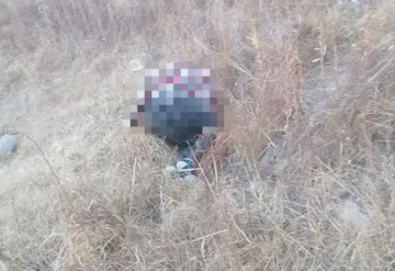 Hallan cadáver con tiro en la cabeza en Atotonilco de Tula