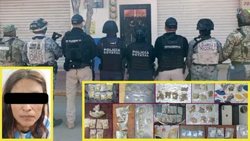 Elementos de seguridad durante un cateo realizado en San Agustín Tlaxiaca.