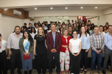 Firma de convenio entre PIBEH y universidad.