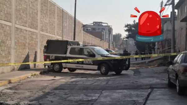 Autoridades acordonaron la zona tras el hallazgo de restos humanos en huacal en una calle de Tultitlán.