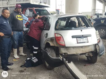 Automóvil impactado por una locomotora