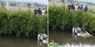 Auto sale del camino y cae a canal sobre la carretera Actopan-Ixmiquilpan