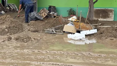 Vivienda afectada por un deslave y el ingreso de lodo en Tula de Allende.