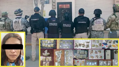 Elementos de seguridad durante un cateo realizado en San Agustín Tlaxiaca.